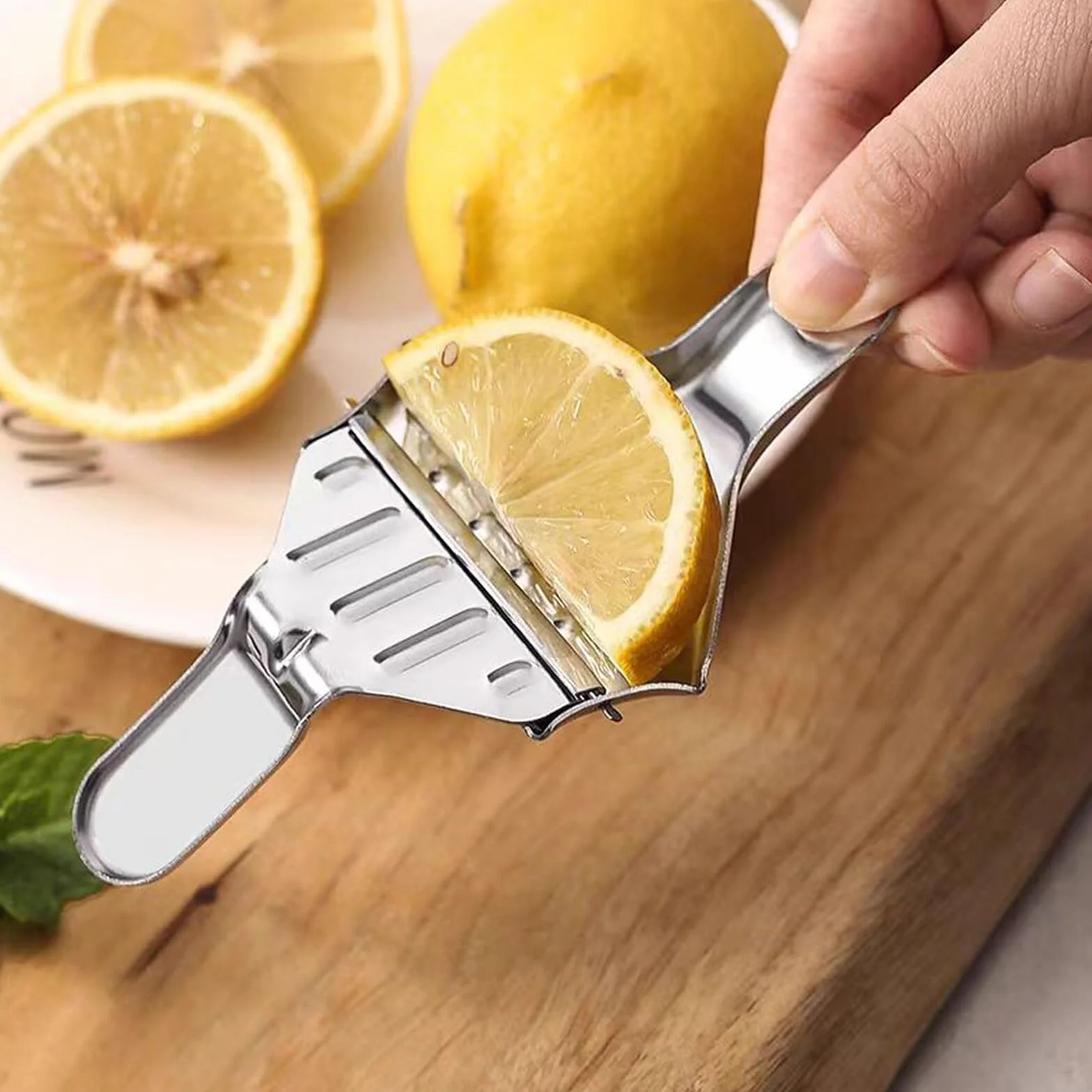 Zitronenschnitzelpresse,2 PCS Handbuch Entsafter Kleine Zitruspresse Handheld Zitronenpresse aus Edelstahl Orangenpresse Manuell Saft Wedge Werkzeuge Küche Zitronenkeilpresse